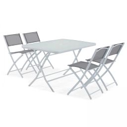 Table de jardin et 4 chaises pliantes en acier et verre gris