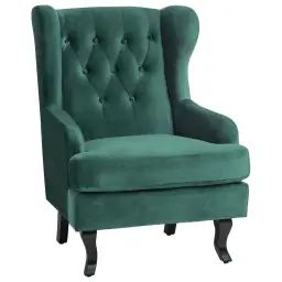Fauteuil en velours vert foncé