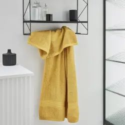 Drap de bain uni en coton jaune 70×130