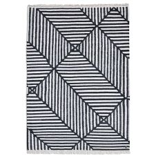 Tapis kelim graphiquement nature en laine noir et blanc 65×135